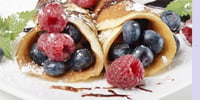 Photo de la Recette: Crêpes Citronnées au Sucre et aux Baies Fraîches