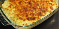 Photo de la Recette: GRATIN DE POMMES DE TERRE AU JAMBON ET AUX POIREAUX