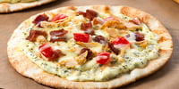 Photo de la Recette: Pizzas sur Pita au Poulet et aux Épinards