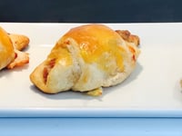 Photo de la Recette: Croissants Saucisses Piquantes Style Pizza