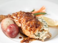 Photo de la Recette: CUISSES DE POULET FARCIES AU OKA