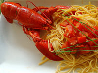 Photo de la Recette: Homard Dégustant ses Spaghetti aux Dés de Tomates