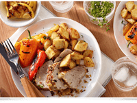 Photo de la Recette: Morceaux de Pommes de Terre Pelure Rouge avec Filet de Porc au Thym