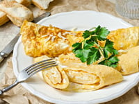 Photo de la Recette: Omelette Roulée au Fromage