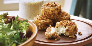 Photo de la Recette: Rondelles de Chèvre sur Verdure Arrosées de Vinaigrette aux Grain