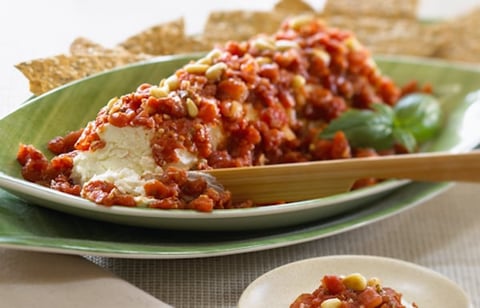 Fromage de Chèvre Mariné dans des Tomates Épicées