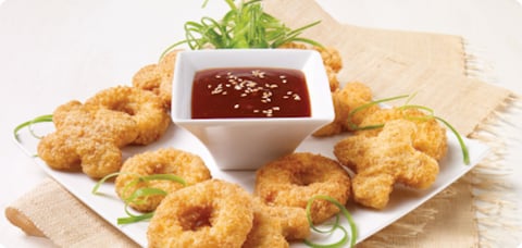 CROUSTILLANTES PÉPITES DE POULET XOXO, SAUCE AU MIEL ET AIL