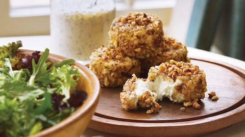 Rondelles de Chèvre sur Verdure Arrosées de Vinaigrette aux Grain